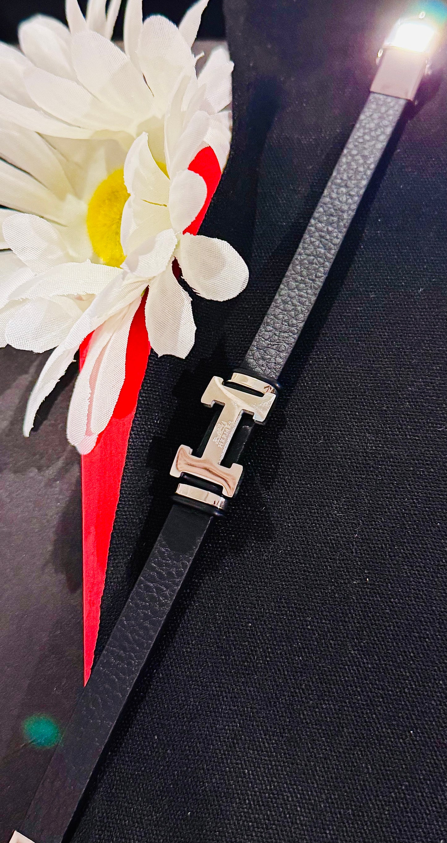 H silver black leather bond